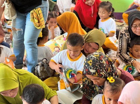 Education is the key to peace in Prof. Santoli’s Asia America Initiative peace building program. Parents also receive remedial literacy classes and assist teachers.