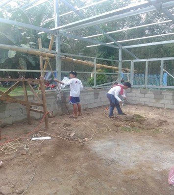 New school buildings bring hope to remote communities. Labor by parents and other local volunteers providethe teamwork needed for peace and development in areas with longstanding guerilla war.