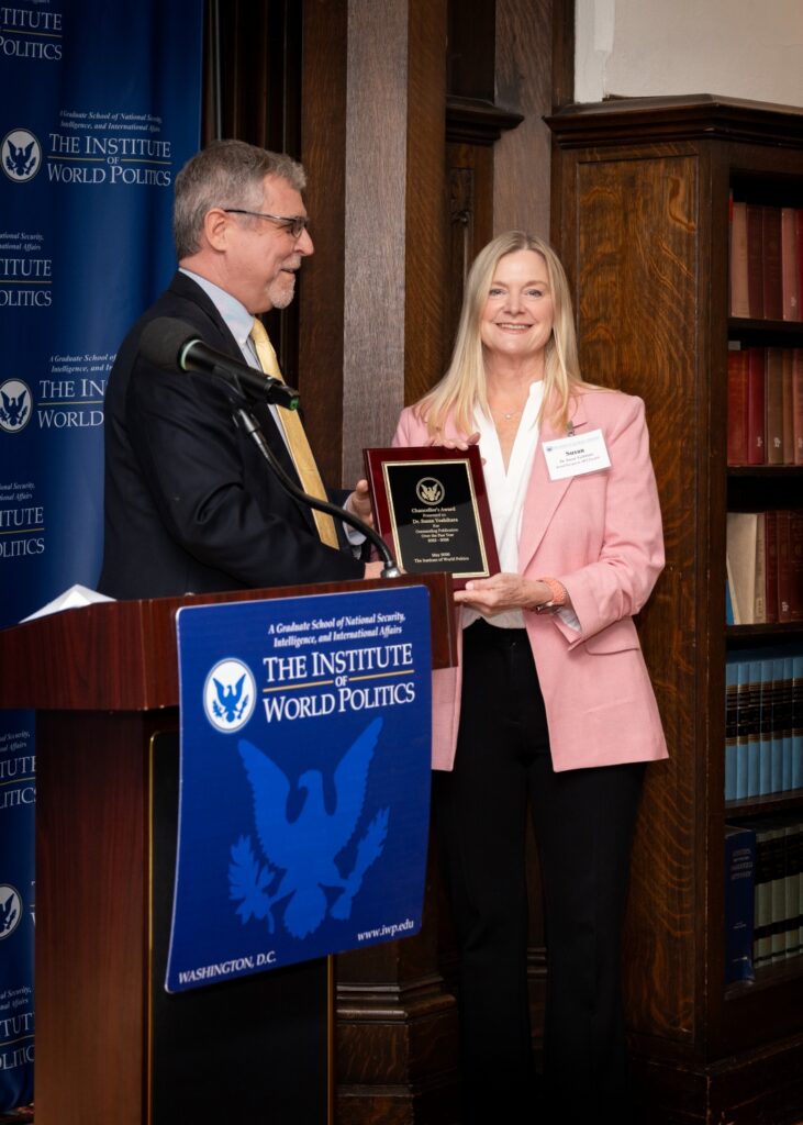 Dr. James S. Robbins recognizes Dr. Susan Yoshihara with the Chancellor’s Award for Outstanding Faculty Publication